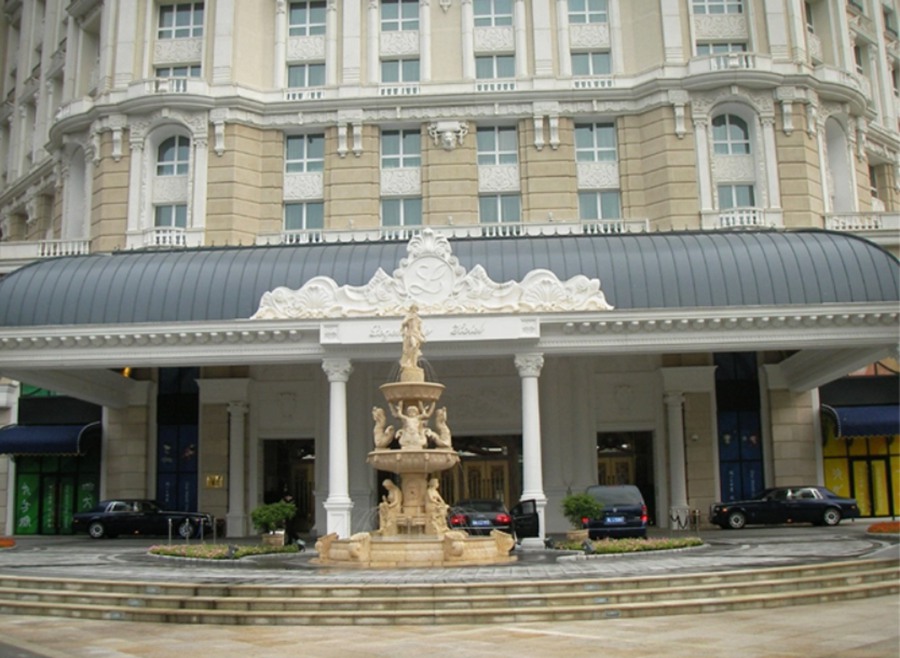 beige poseidon water fountain for hotel