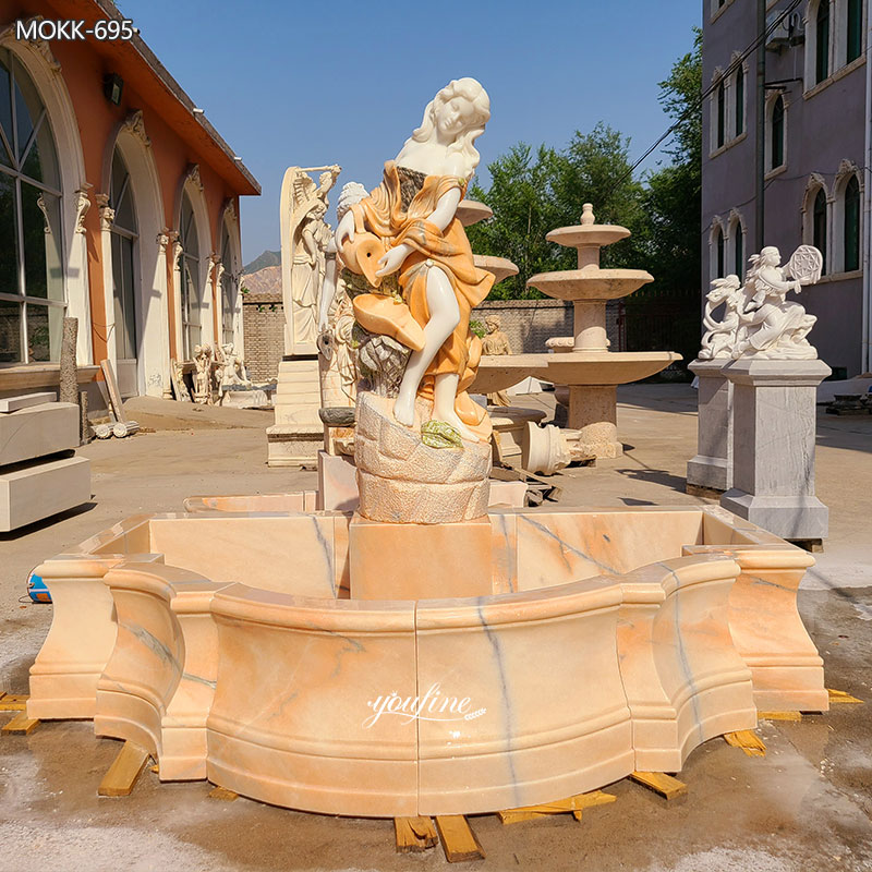 marble woman pouring water statue