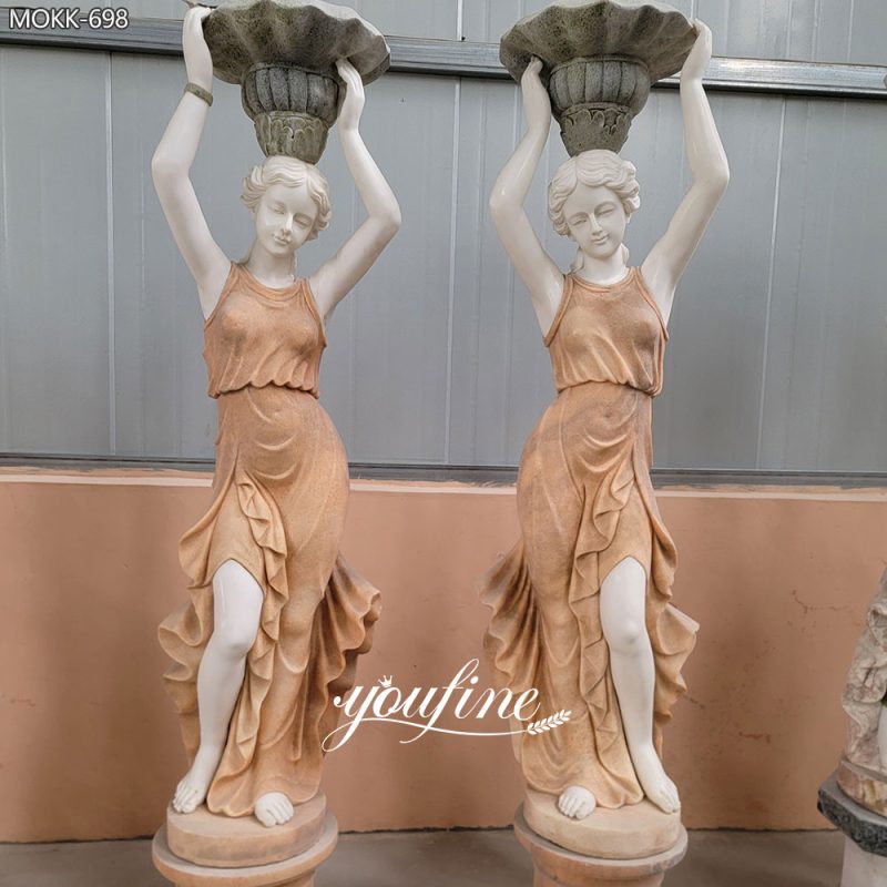 Buitenbeeld van een dame in Europese stijl, gemaakt van marmer, met lamp.