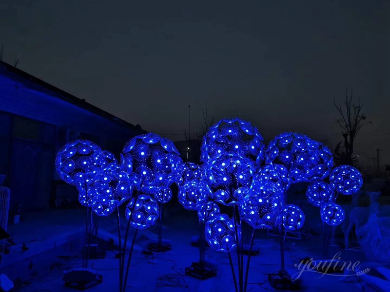 stainless steel dandelion sculpture with light