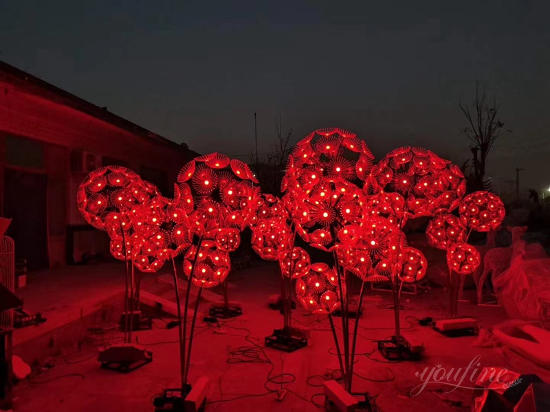 stainless steel dandelion sculpture with light