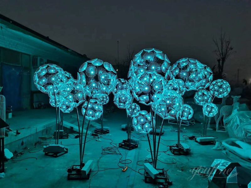 stainless steel dandelion sculpture with light