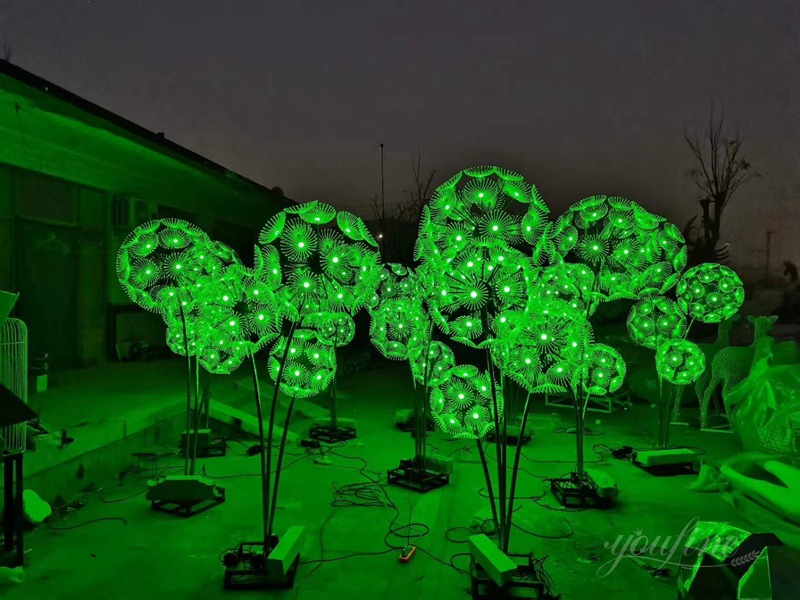 stainless steel dandelion sculpture with light