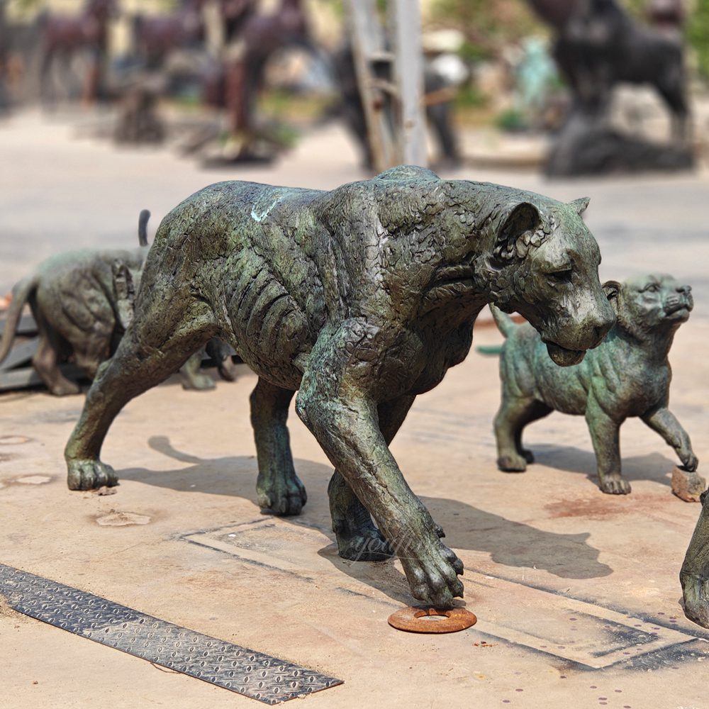 walking bronze lion family sculpture