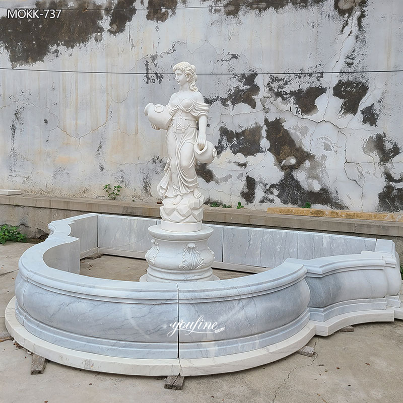 white marble statue water fountain