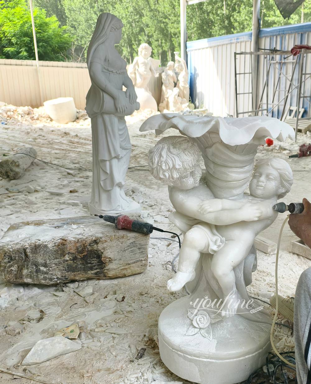 carving Baby Statue