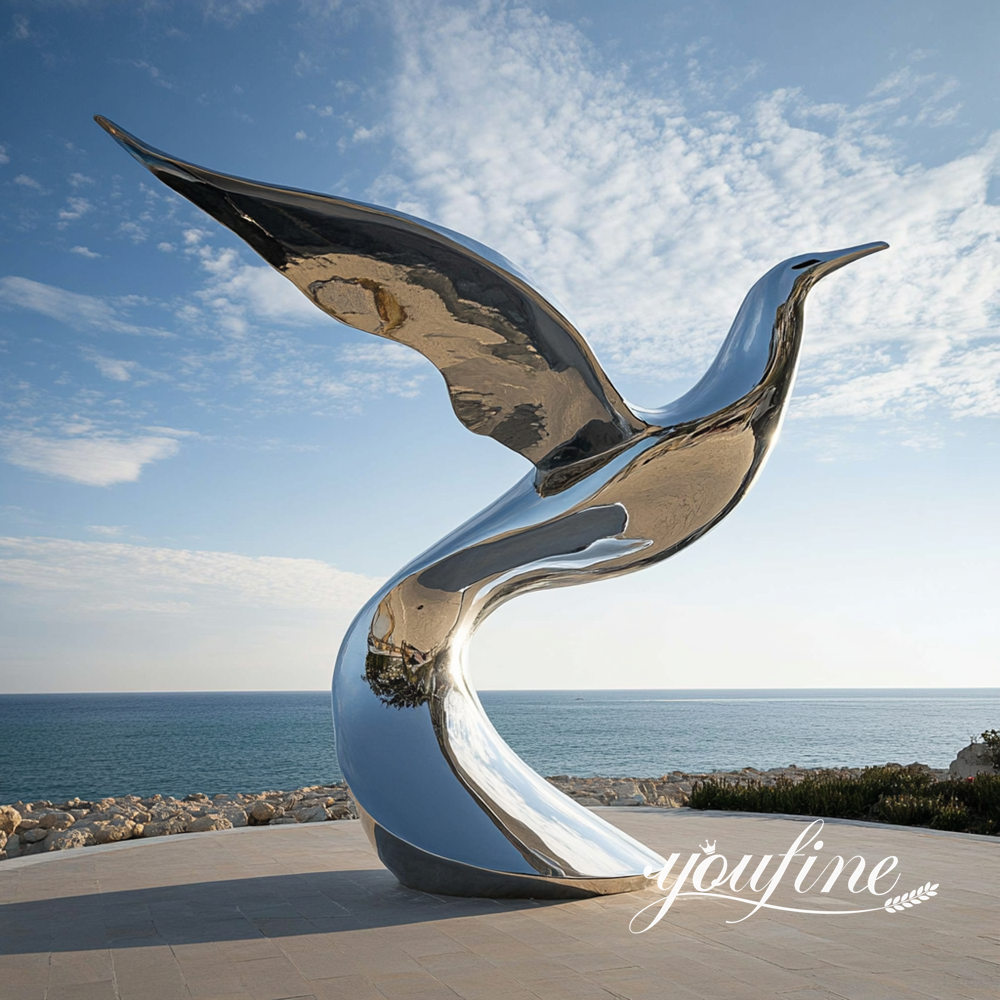 large stainless steel Seagull sculpture nearby seaside
