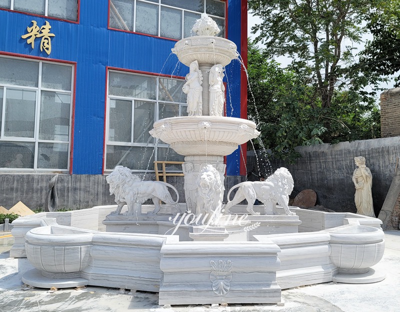 marble lion fountain with figure statue