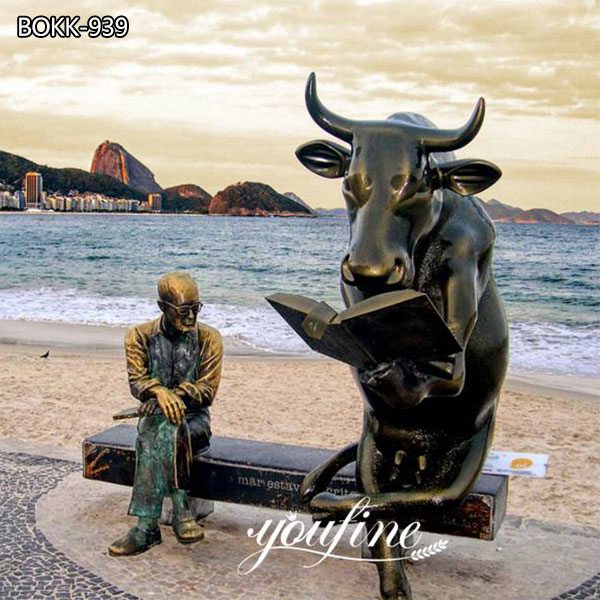 Large Sitting Man and Bull Reading Statue