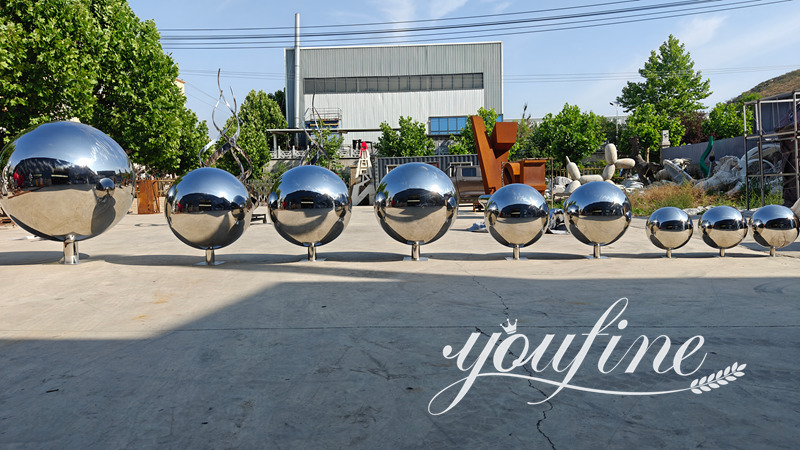more stainless steel globe sculpture