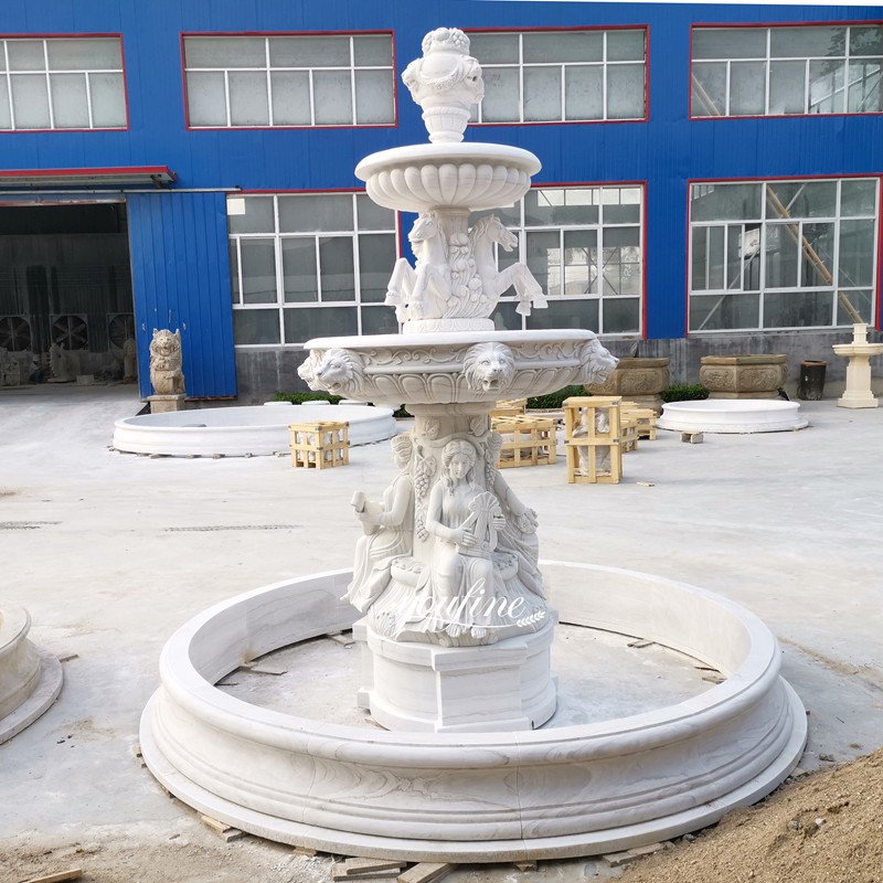 woman statue and horse marble fountain