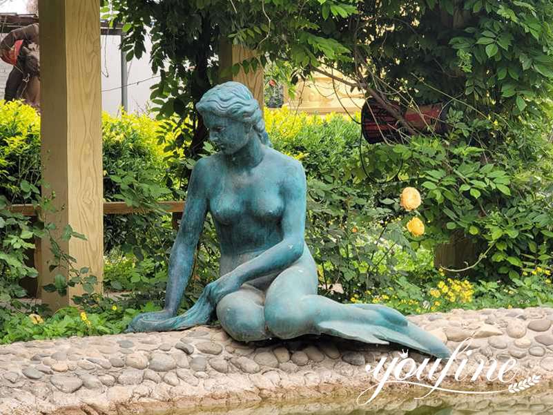 solid bronze mermaid statue