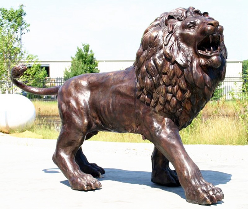 Brass-lion-statue-walking-animal-outdoor-sculpture