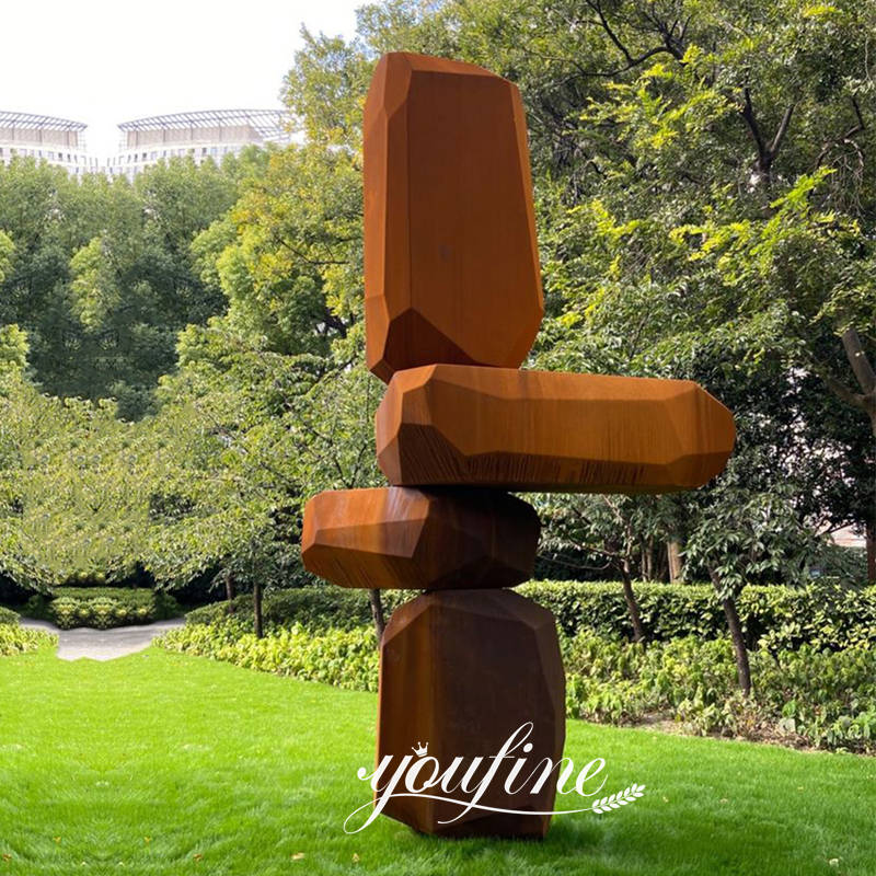 large corten steel stacked stone sculpture