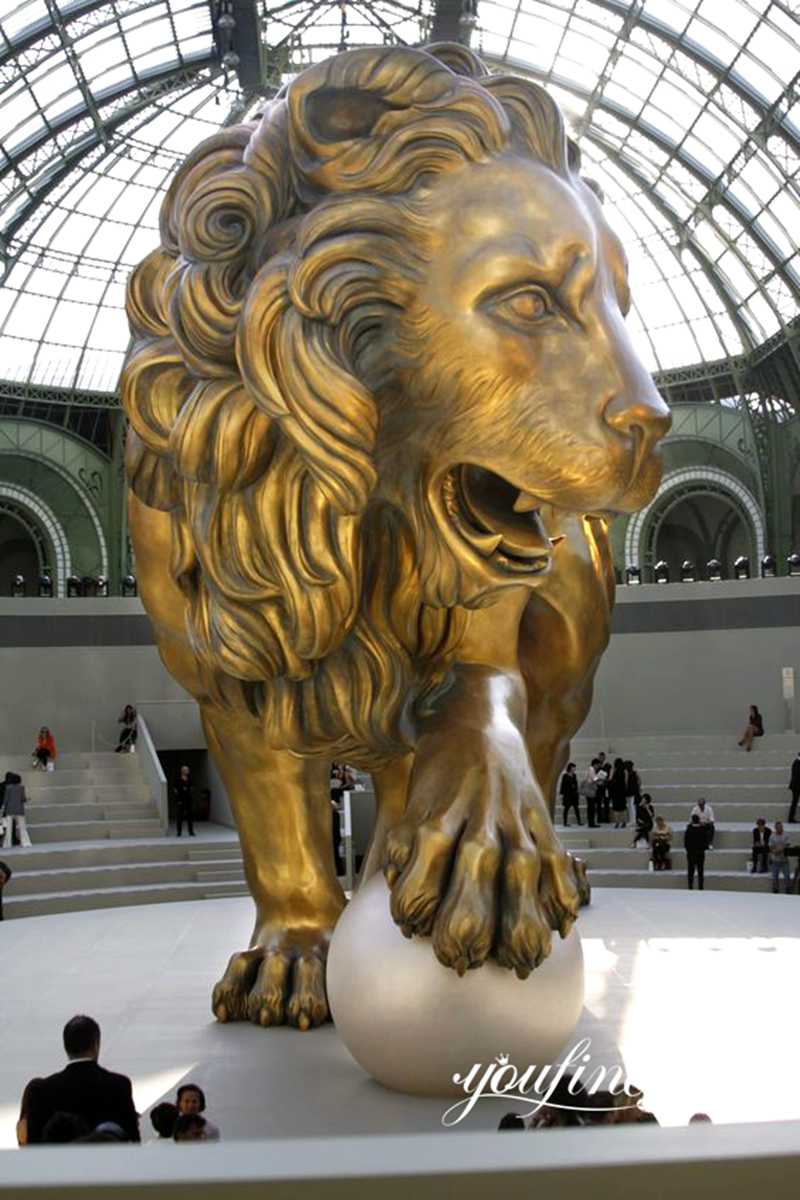 The giant golden lion sculpture with white pearls: