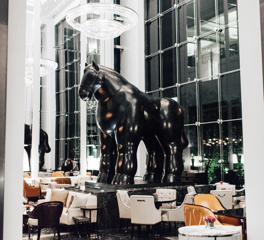 botero style monumental horse for hotel lobby