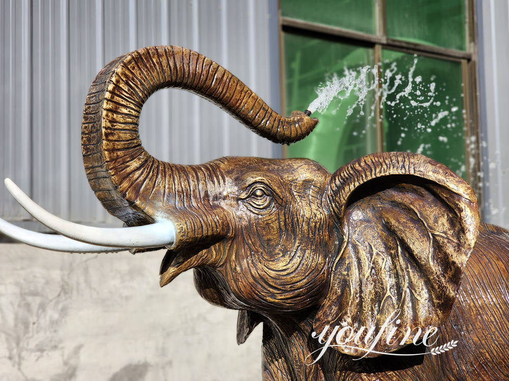 facial details of bronze elephant fountain