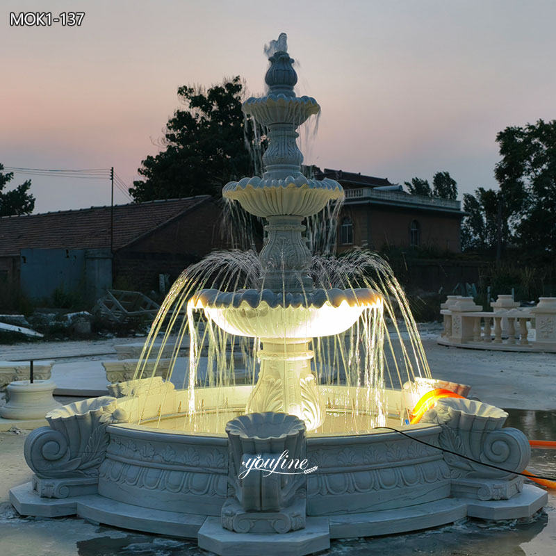 white fountain with light