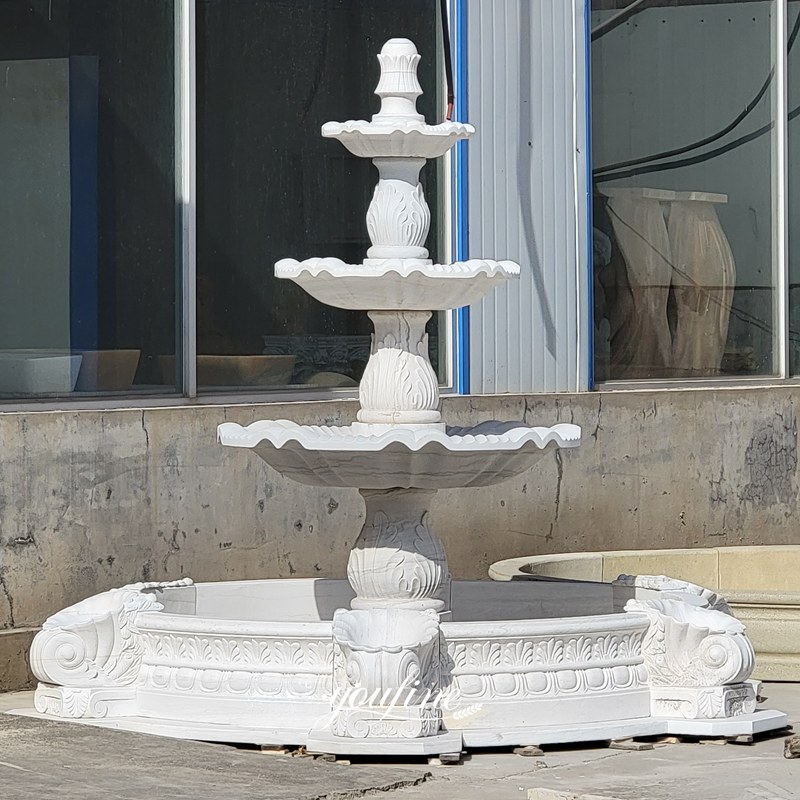 white marble fountain with Conch Flower Pot
