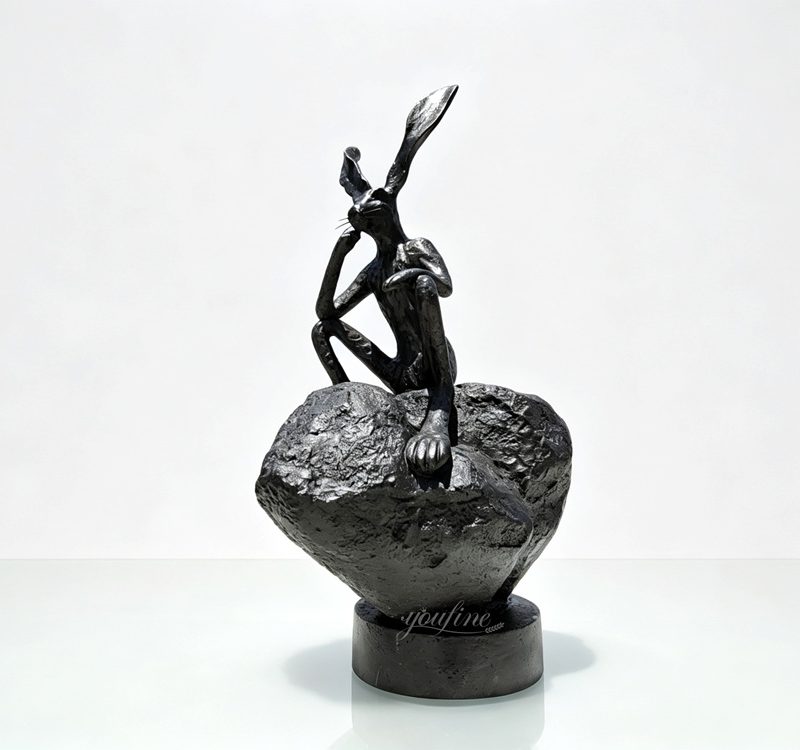 Thinker on a Rock