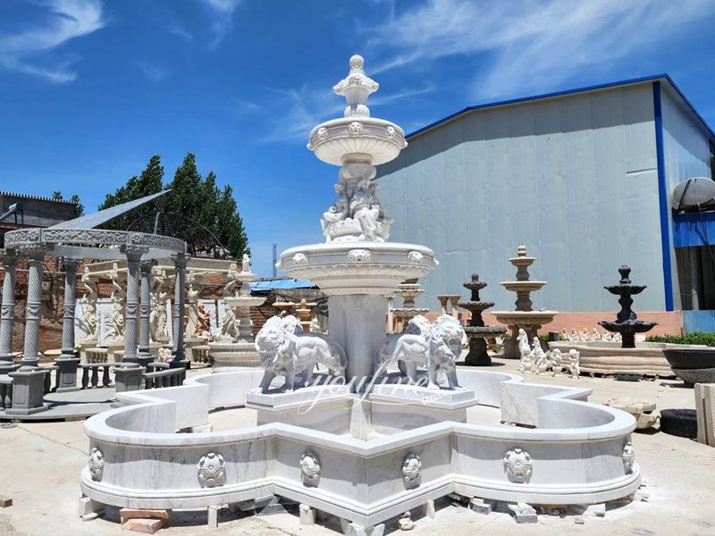 lion outdoor fountain with female