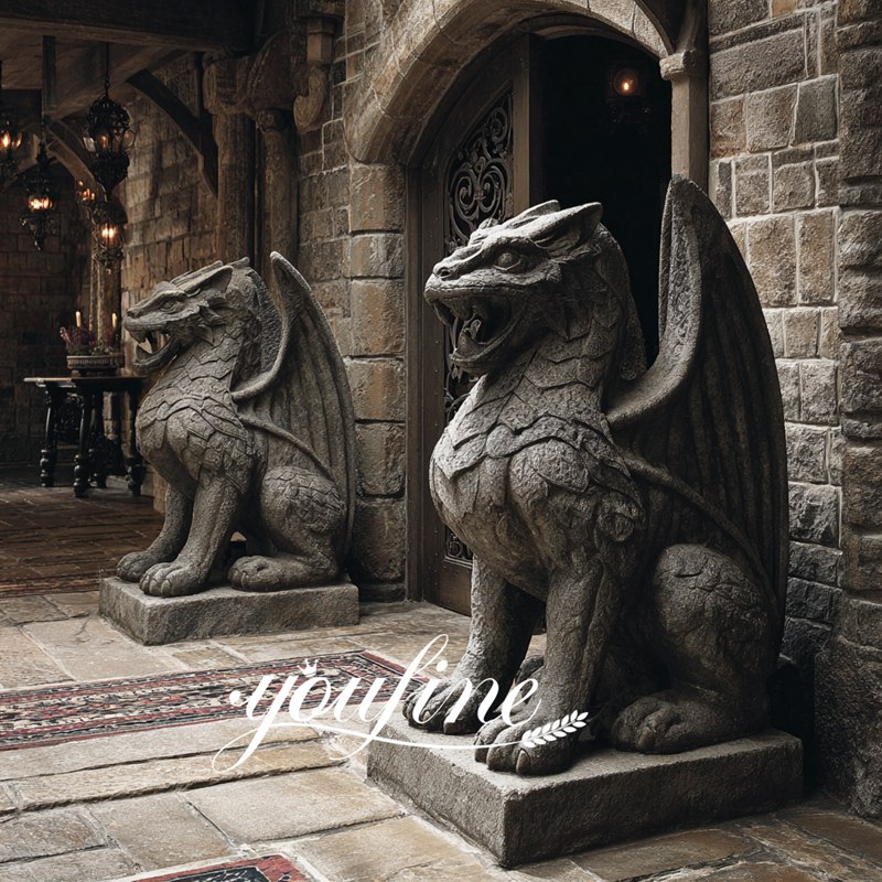 winged black stone gargoyle statue