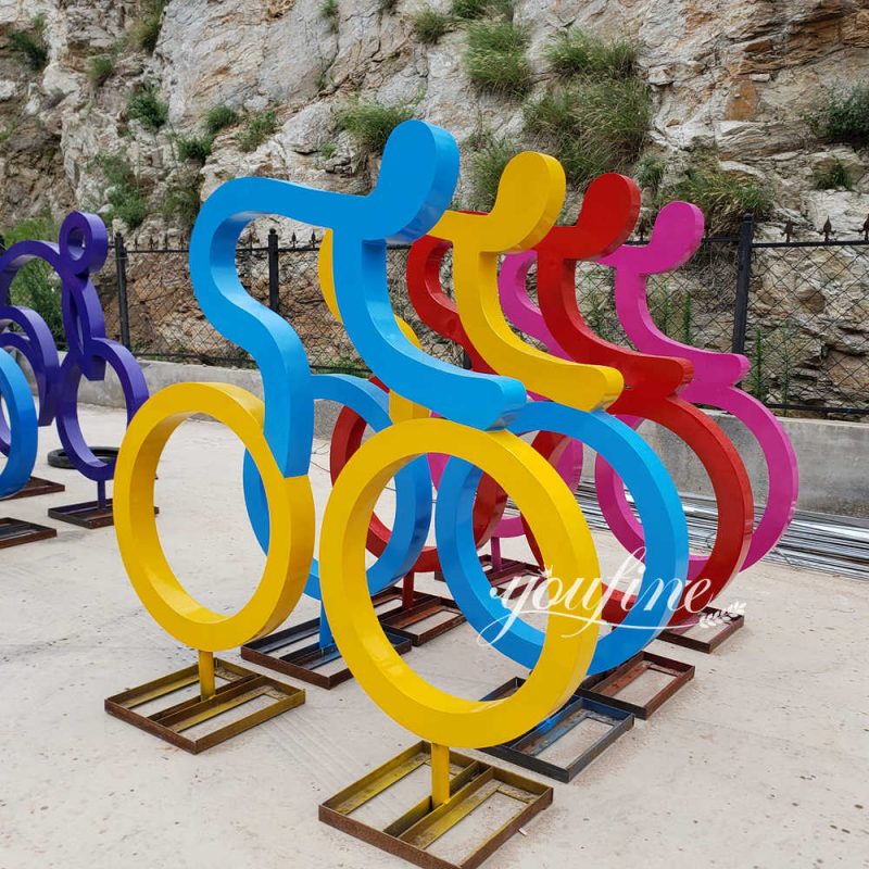 colorful metal cyclist sculpture
