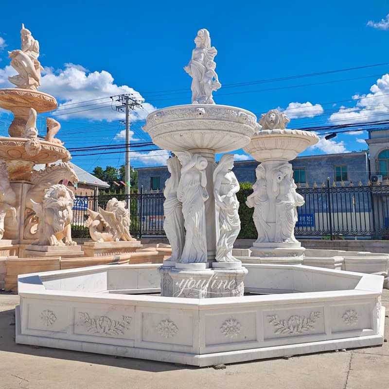 white marble woman statue water fountain