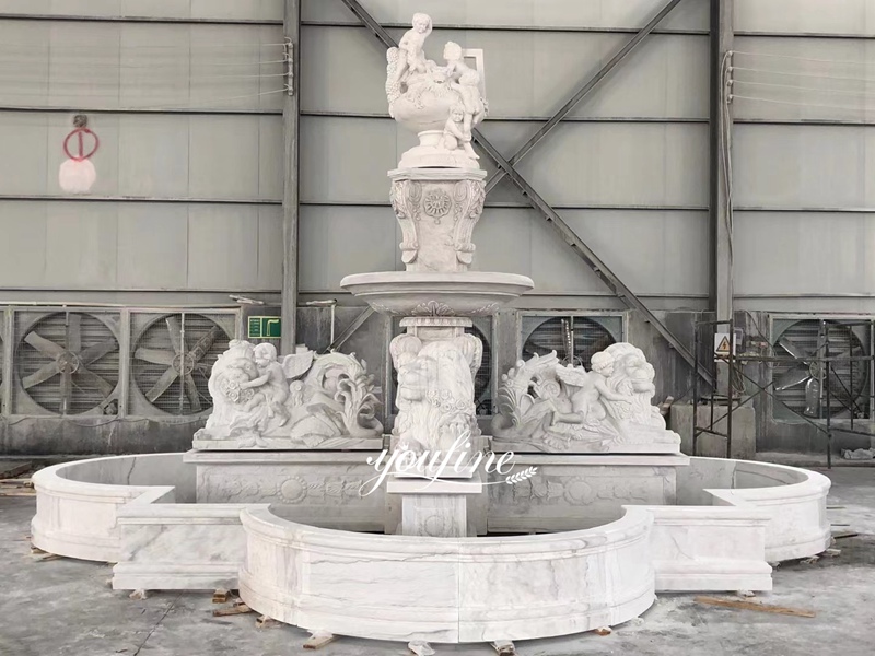 Fountain with cherub and lion sculptures