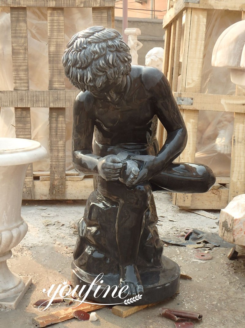 Boy with Thorn sculpture