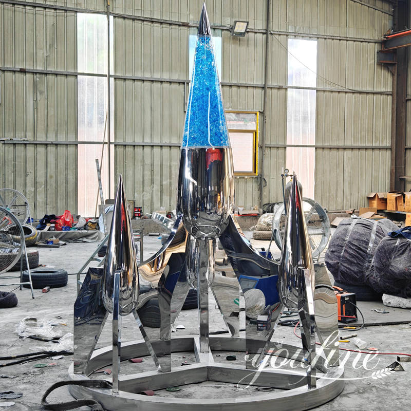 large steel rocket sculpture