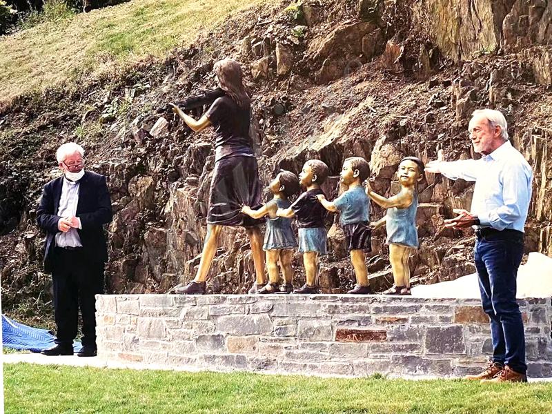 teacher and child sculpture