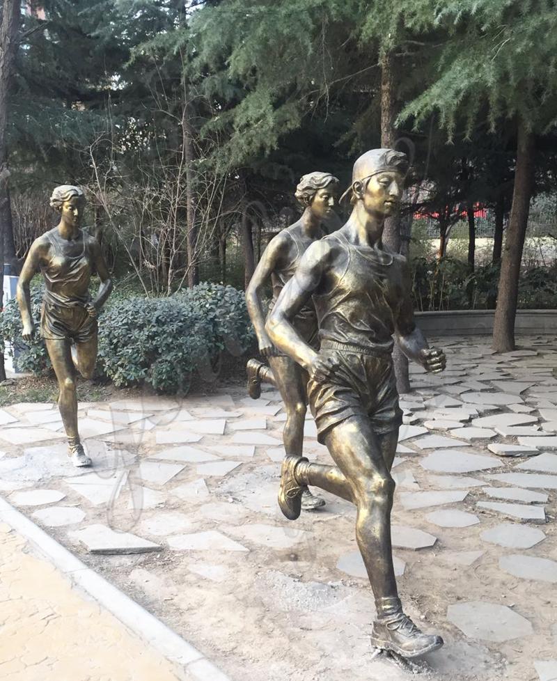 Bronze runner sculpture