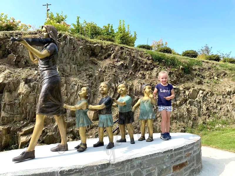 bronze children statues