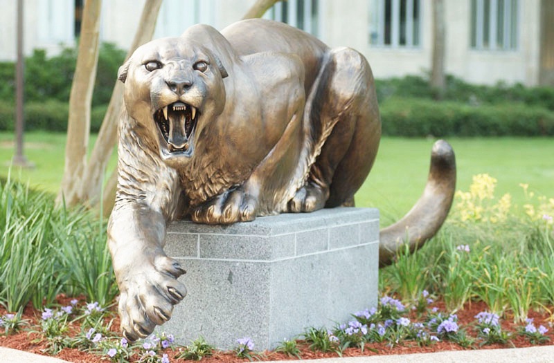 Bronze cougar mountain lion statue