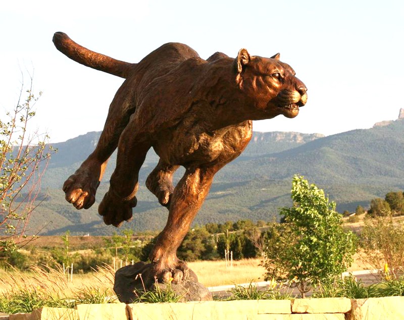 Bronze cougar statue