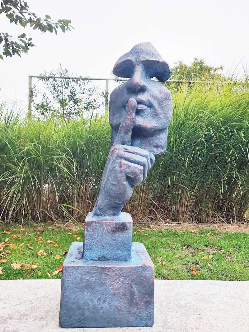 Evocative bronze face representations