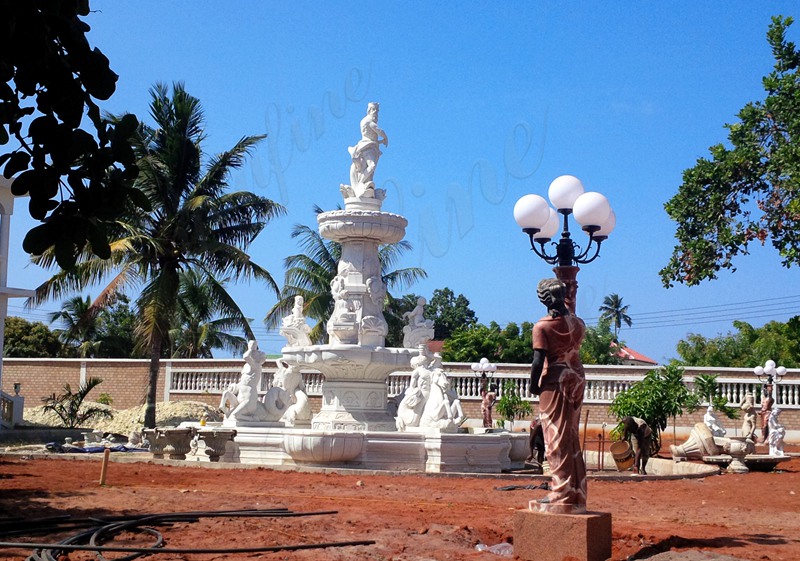 Large stone fountain with statues