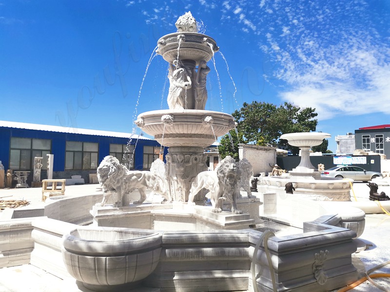 Grand marble lion sculpture fountain