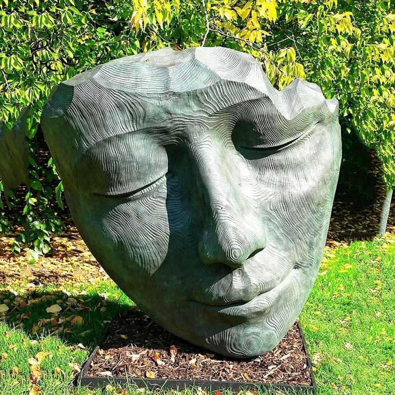 Personalized bronze face statues