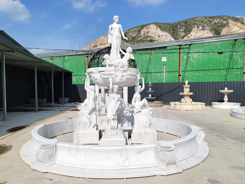 modern fountain and marble statue