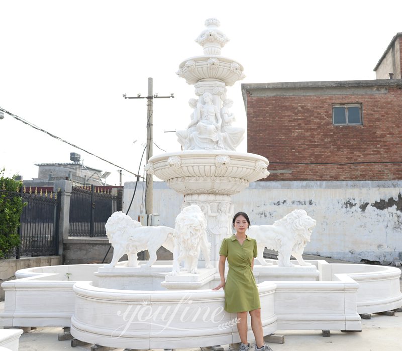 Hand-carved marble lion fountains
