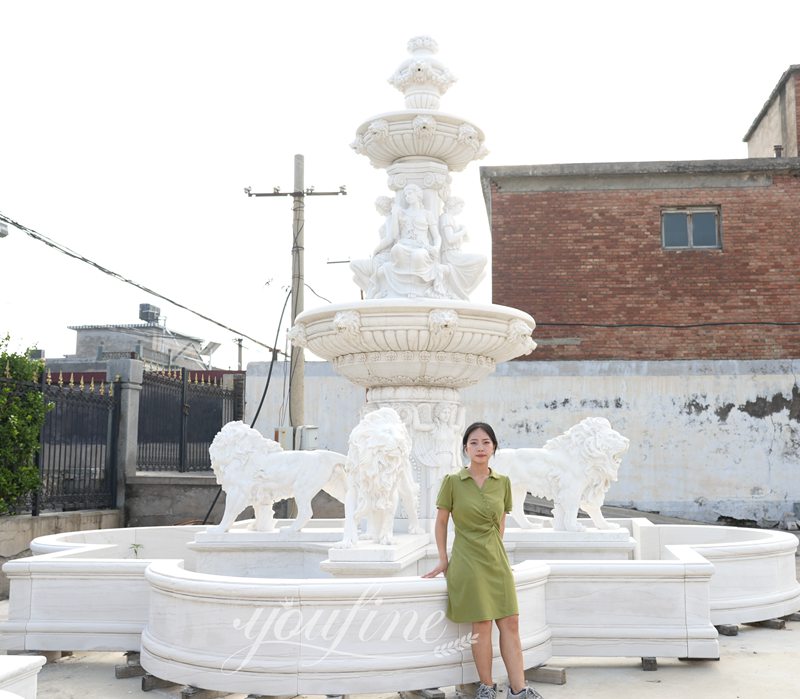 Hand-carved marble lion fountains