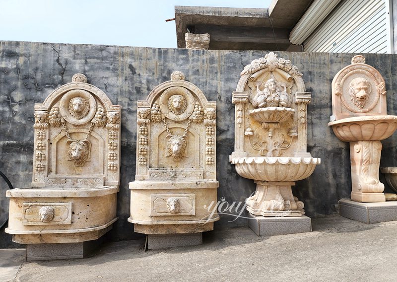 Lion head statue marble wall fountain