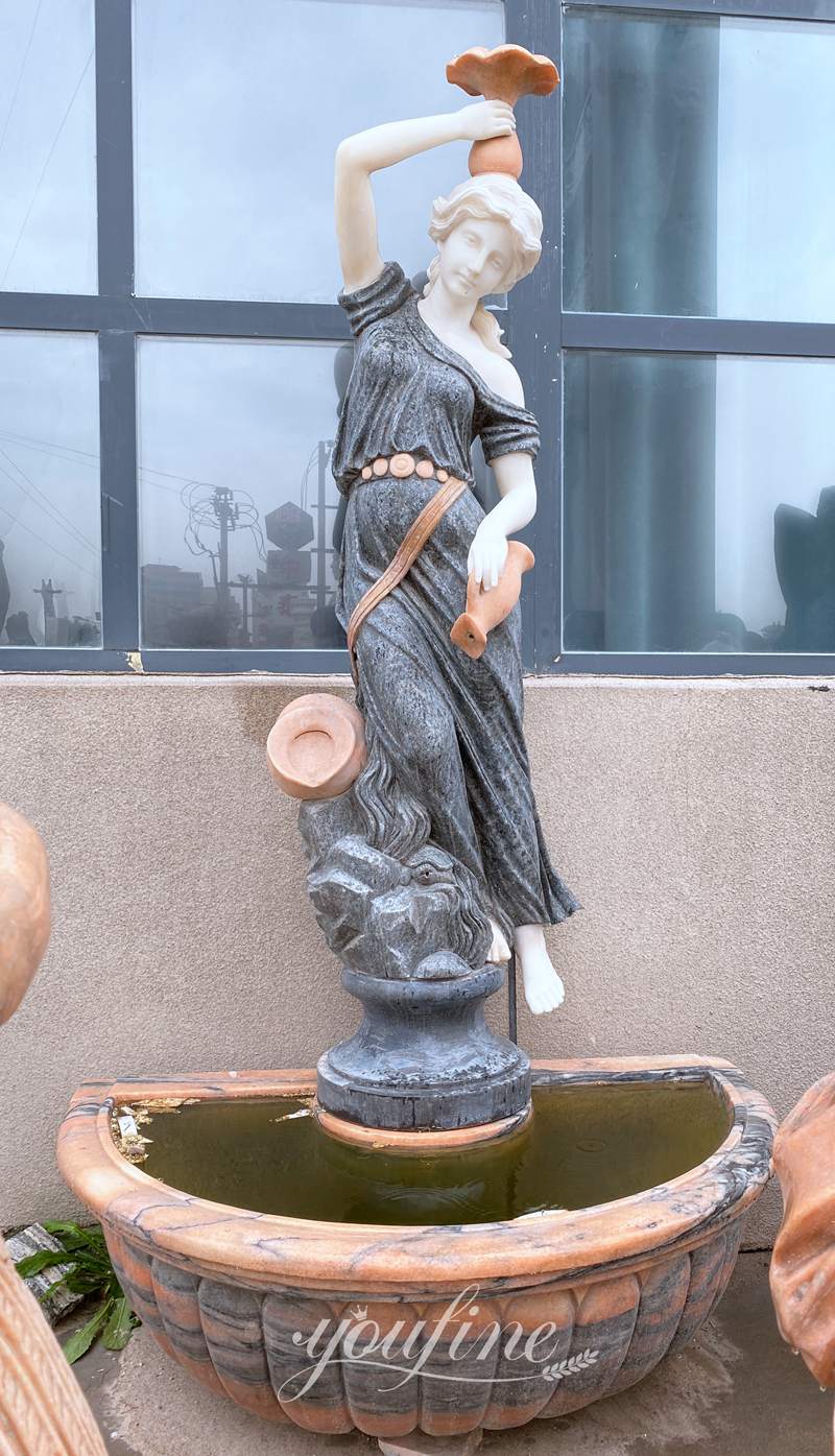 female figure statue marble wall fountain