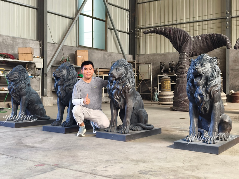 four large outdoor lion statues