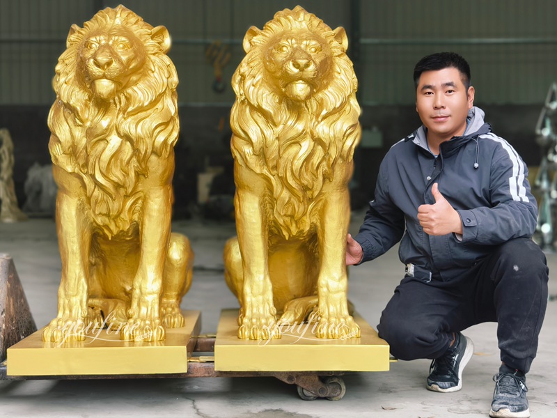 golden large outdoor lion statue