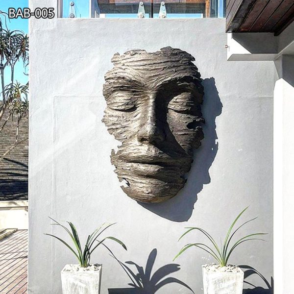 Famous bronze face sculpture