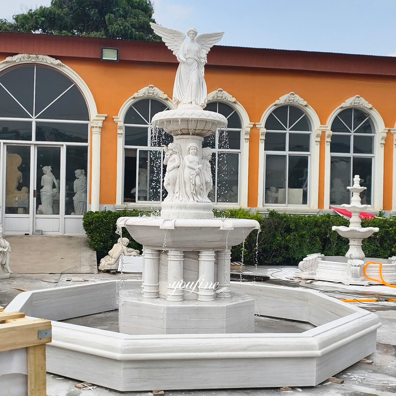 marble Angel Fountain with flowing water