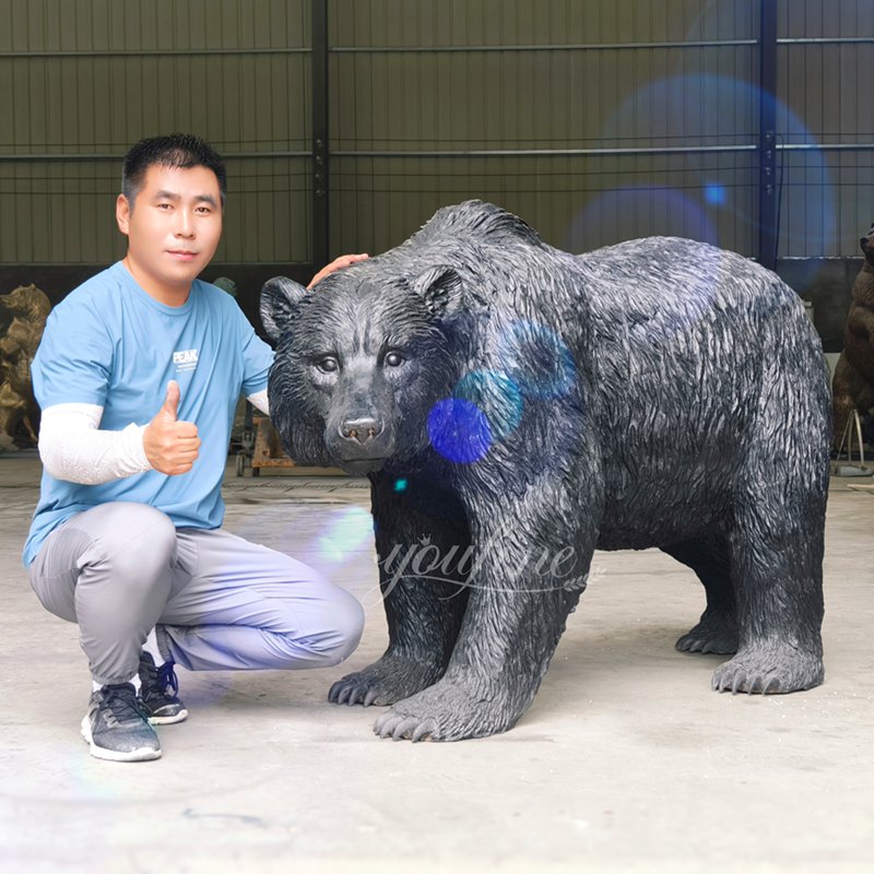 Black walking bear sculpture
